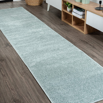 Haze Solid Low-pile Area Rug Light Blue